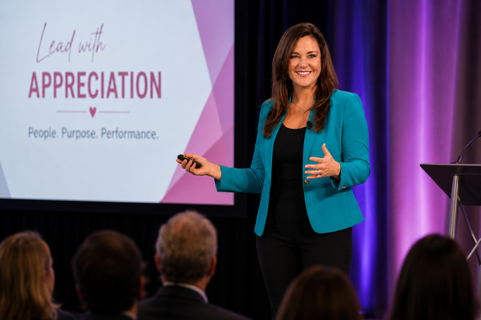 Dr. Amber Teamann speaking on stage